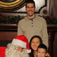 Family of three with Santa
